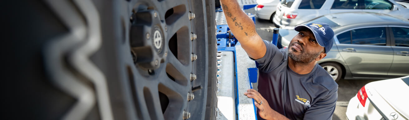 A supplier working with a vehicle.