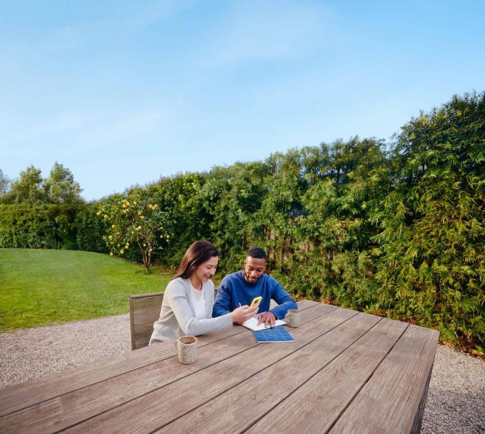two people at a park bench